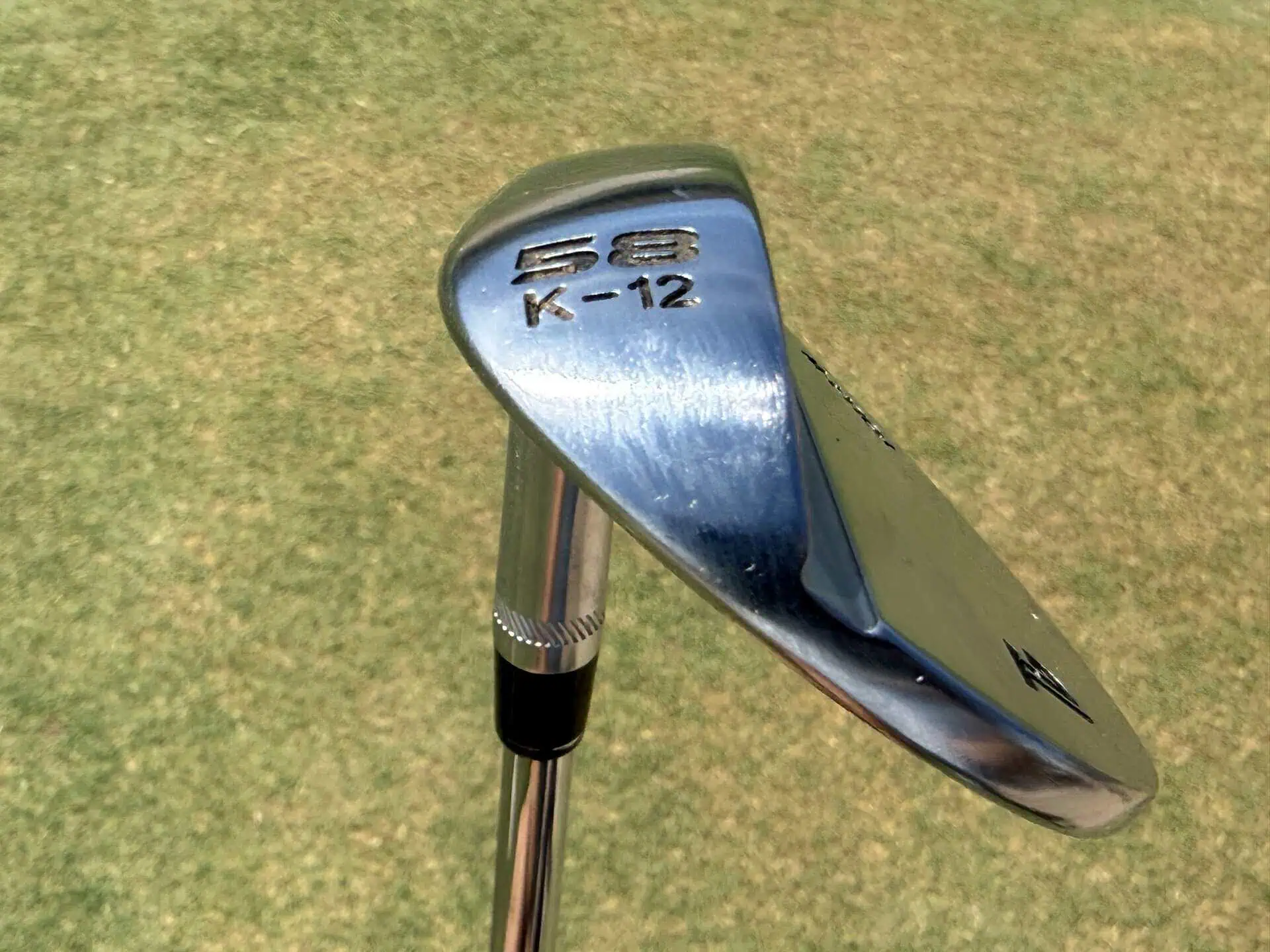 58-degree K-grind Tour-W wedge showing its stamp
