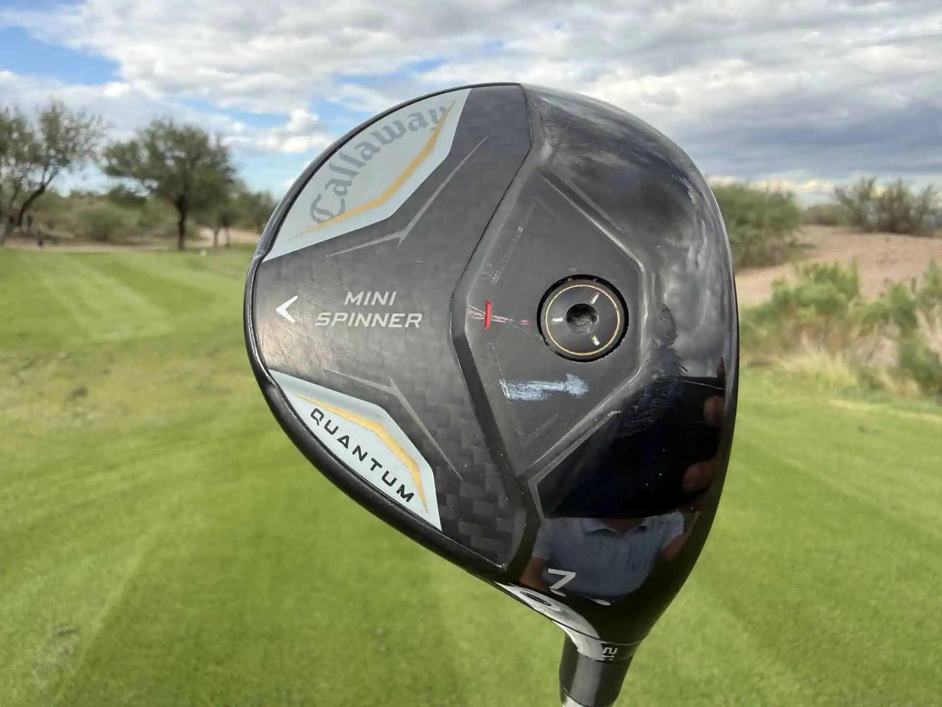 The Quantum Mini Spinner 7-wood sole on a fairway